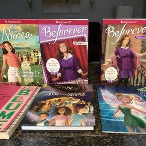 American Girl set of three books and others in almost new condition.